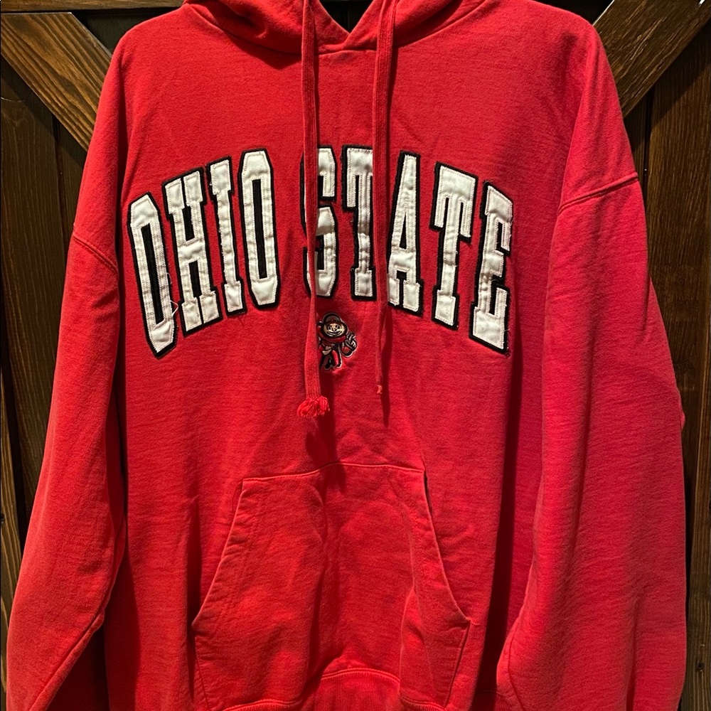Large Ohio State Hooded Sweatshirt red with white lettering along with mascot.